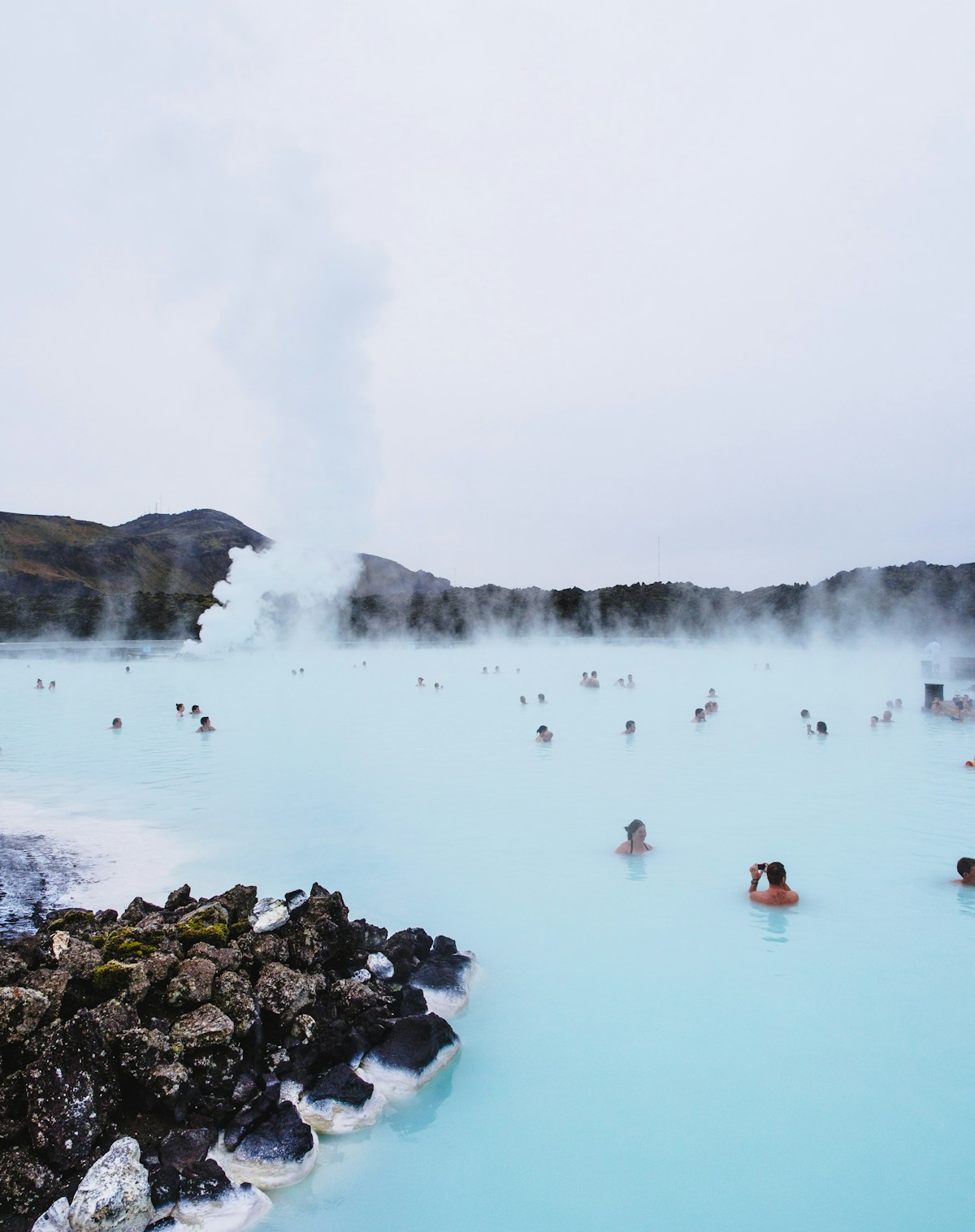 Steam rising from a geothermal hot pool in Iceland — the new Laugarás Lagoon has opened on the Golden Circle route