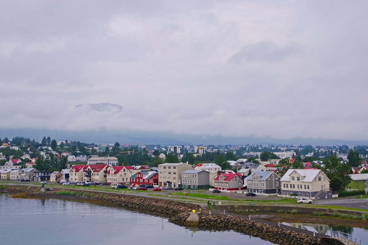 Colourful buildings of Akureyri coastal town under a cloudy sky, north Iceland