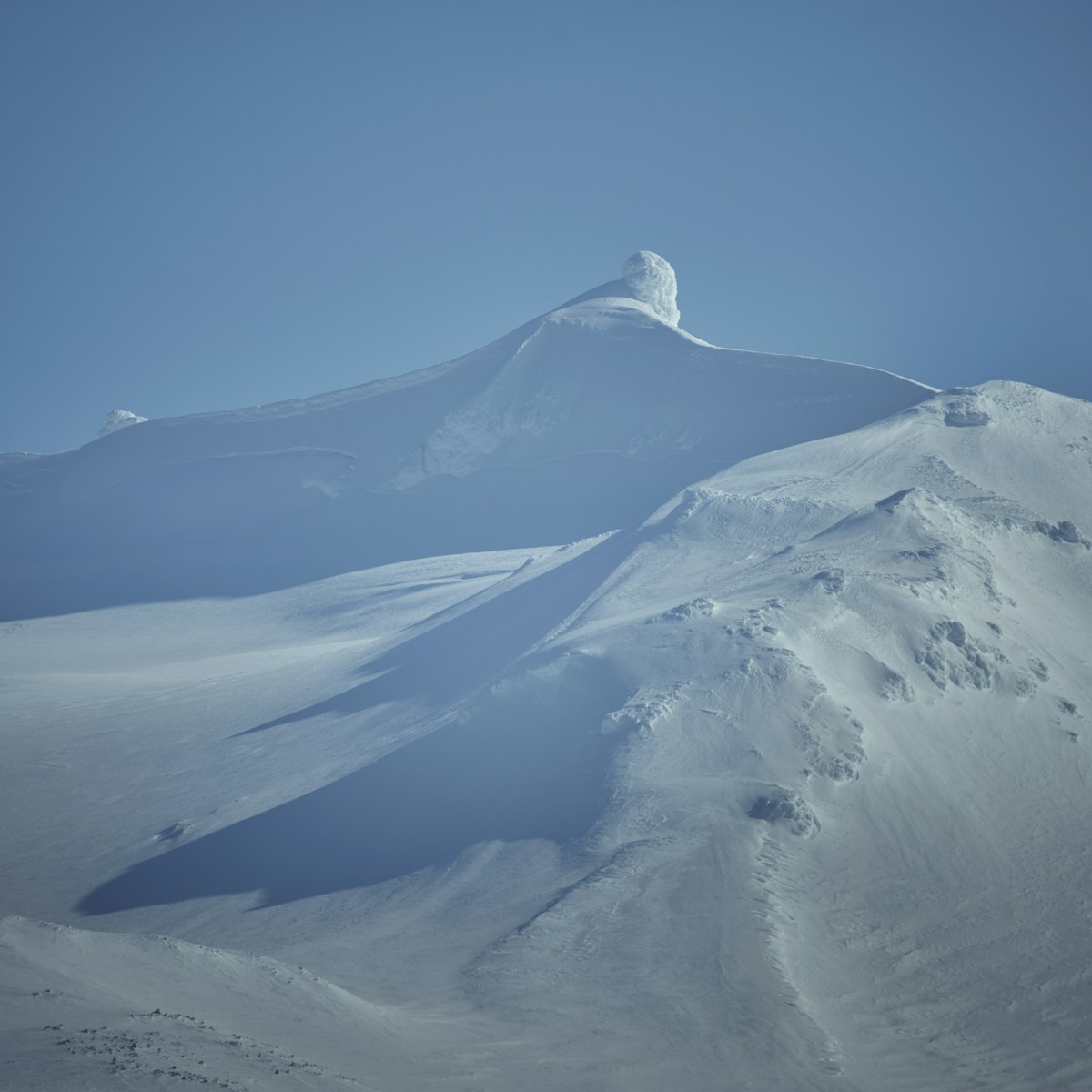 Snow-capped summit of Snæfellsjökull glacier volcano rising above the Snæfellsnes Peninsula, Iceland