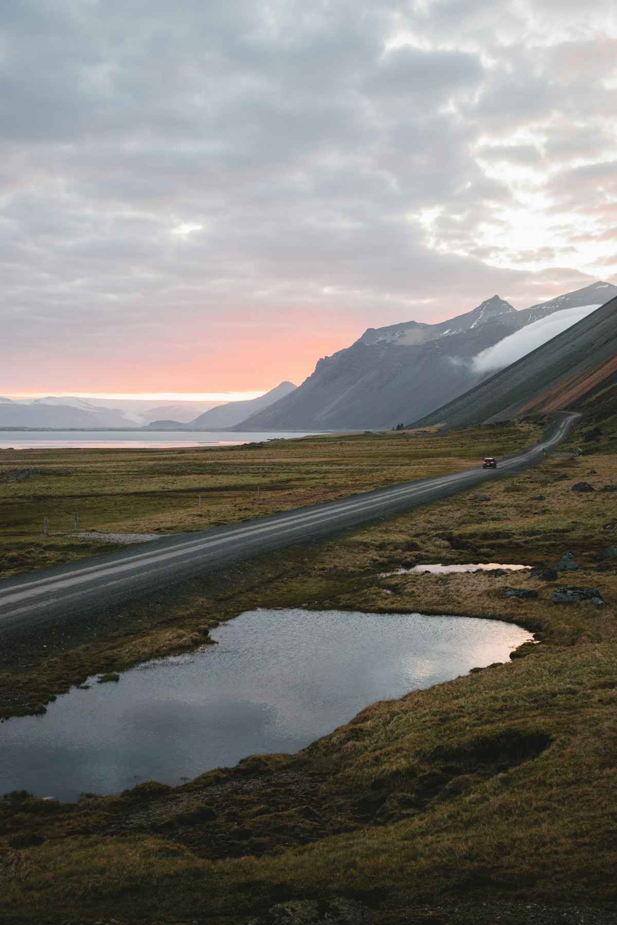 Road with puddle at Vestrahorn, Iceland — September autumn colours
