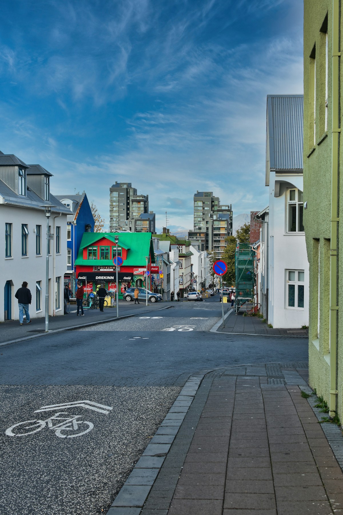 Street scene in Reykjavík with colourful buildings and Icelandic shop signs