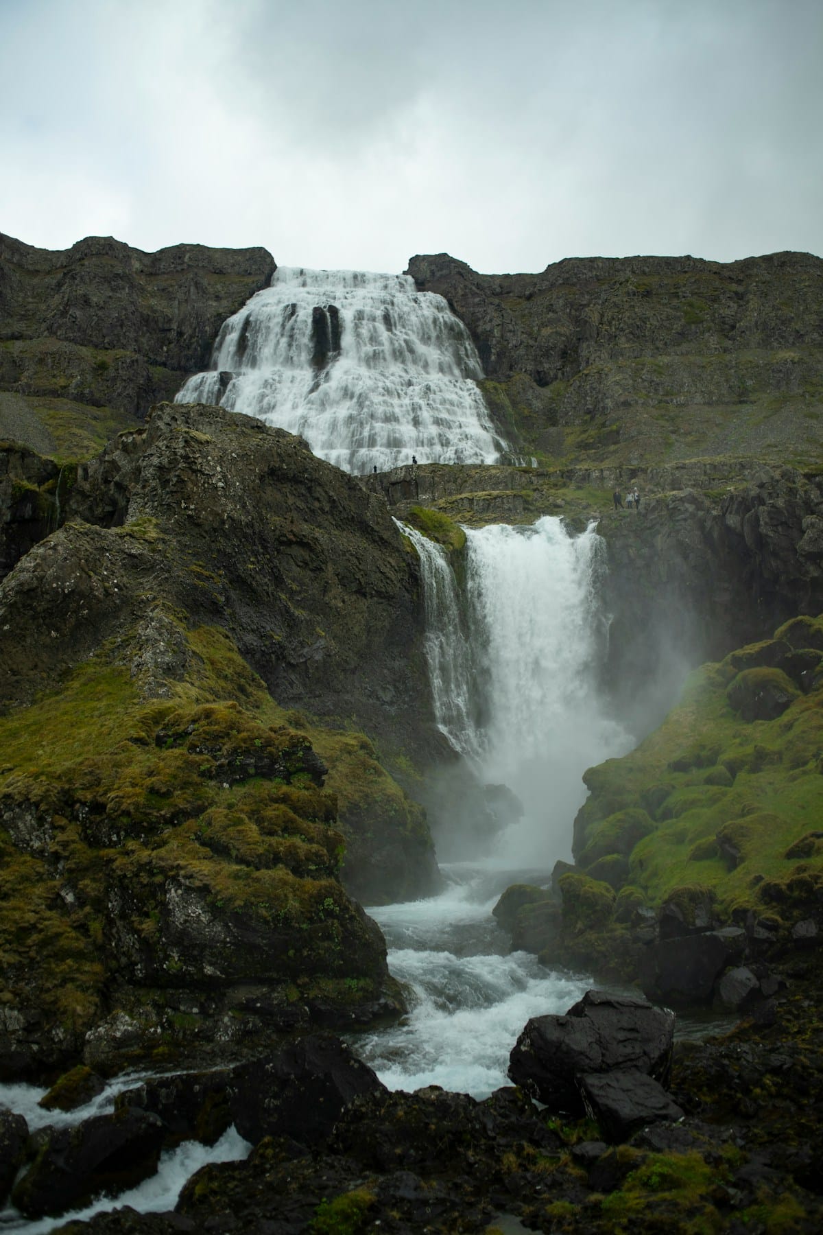 Dynjandi waterfall cascading in fan shape over rocky cliffs, Westfjords, Iceland