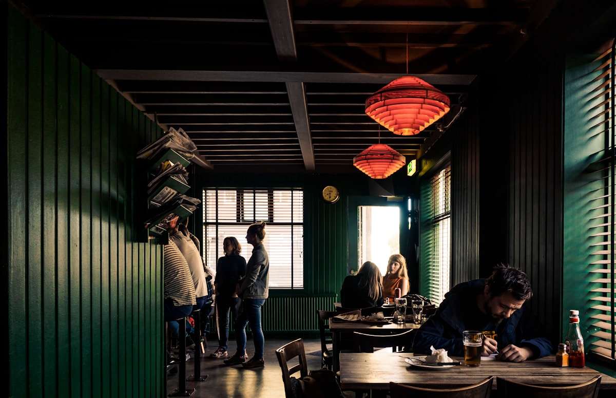 Group of people dining inside a restaurant in Reykjavík, Iceland