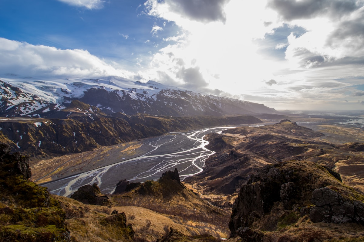 Mountain rising beside a glacier-fed river in Þórsmörk valley, south Iceland
