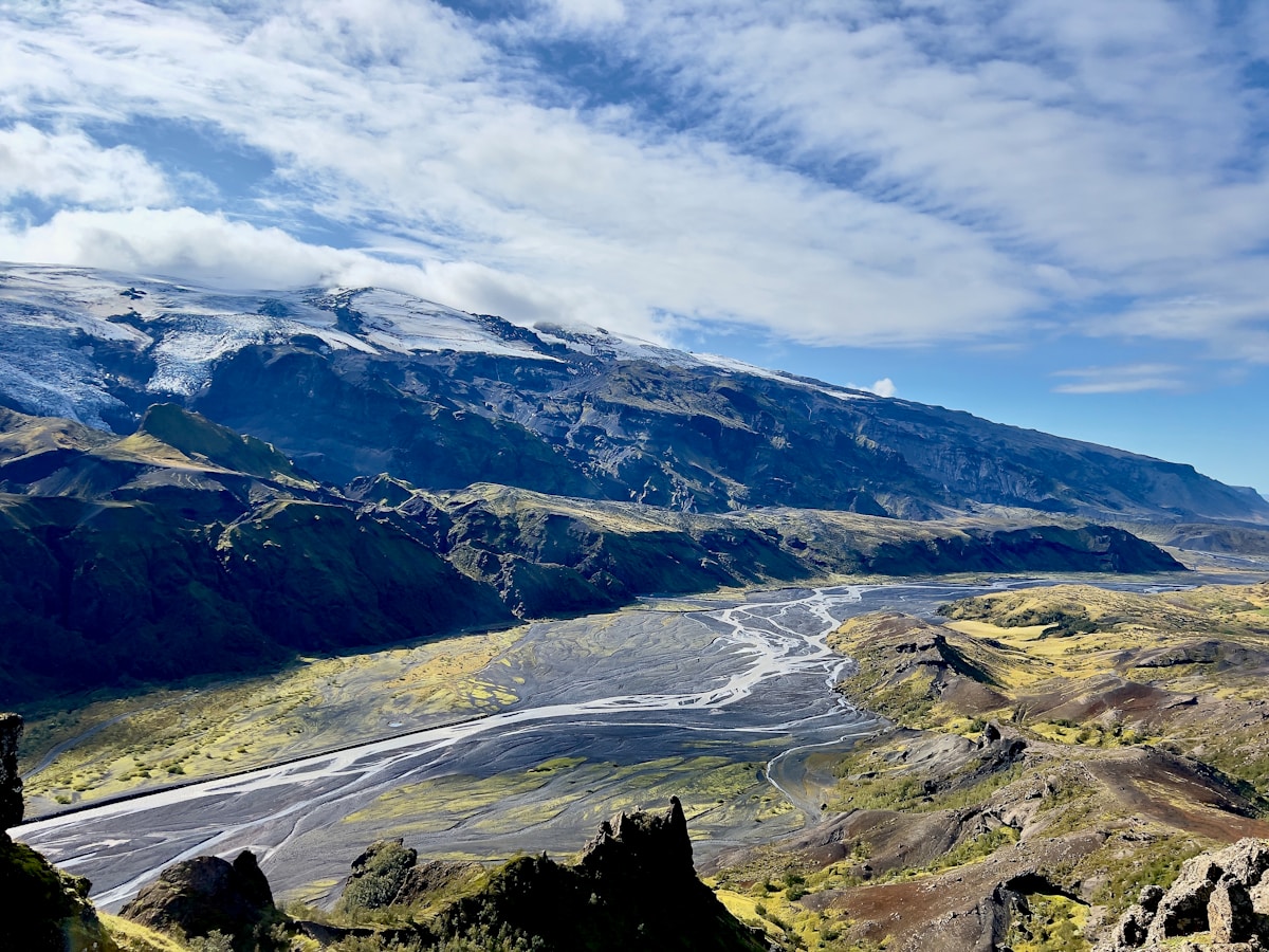 Mountain rising above a river in Þórsmörk valley, south Iceland